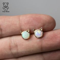 Cute Kitty Cat Ears Round Australian Solid Opal Stud Earrings 14k Yellow Gold. Free Domestic USPS First Class Shipping! Free One Year Limited Warranty! Free Gift Bag or Box with every order! Opal—the queen of gemstones, is one of the most beautiful and rarest gemstones on earth. Every piece of opals has its colors and patterns, which is perfect for designers to create unique engagement rings for someone extra special. We use 100% Natural & Ethically opal stones (NO synthetics or imitations) for Elegant Cat Ears Jewelry With Cat Design, Elegant Cat Ears Jewelry Gift, Gold Cat Design Earrings For Gifts, Gold Cat Ears Jewelry As Gift, Gold Cat Ears Jewelry Gift, Gold Cat Ears Jewelry For Gifts, Gold Cat Ears Jewelry For Gift, 14k Gold Jewelry With Cat Design In Gold Color, Yellow Gold Cat Design Jewelry Gift