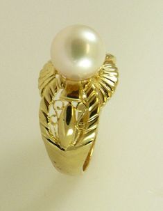 Sku # = 5220 Akoya White 8.5 mm Pearl Ring With 14K Yellow Gold Number of Akoya Pearl = 1 Pearl Size = 8.5 mm Color of Pearl = White Shape of Pearl = Round Gold = 14k Yellow Gold Total Gram Weight = 5.6grams Length in Inches = 0.84 of an inch Width = 0.50 of an inch Length in MM = 21.3 mm Width = 12.9mm This ring is currently size = 7 1/2. Luxury Yellow Gold Pearl Ring For Everyday, Luxury Handmade Yellow Gold Pearl Ring, Elephant Earrings, Gold Number, Coral Necklace, Scroll Design, Akoya Pearls, Gold Price, Dragon Tattoo