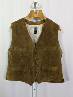 Gap Vintage Brown Suede Leather Backstrap Vest Waistcoat Large. Great condition. Pinstripe lining. Pit to pit: 21" Length: 23" Arm opening: 10" Vintage Leather Vest Outerwear, Vest Waistcoat, Vintage Brown, Brown Suede, Vest Dress, Suede Leather, Gap, Leather