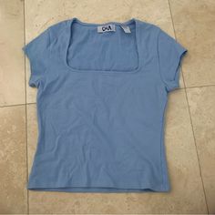 New, Never Worn Women’s Short Sleeve Top Size M Color: Baby Blue 95% Cotton, 5% Lycra Length: 19.5” Please Read About The Posher Page First Any Questions? Please Ask Prior To Purchase Bundle Items And Pay Shipping Only Once! Prices Are Pretty Low Already. No Discounts Can Be Offered At This Time Everyday Fitted Blue Tops, Blue Fitted Tops For Day Out, Light Blue Fitted Y2k Top, Fitted Light Blue Y2k Top, Basic Light Blue Short Sleeve T-shirt, Blue Athletic Fit Short Sleeve T-shirt, Cheap Blue Stretch Cropped T-shirt, Blue Moisture-wicking Short Sleeve Shirt, Blue Moisture-wicking Short Sleeve T-shirt