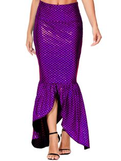 a woman wearing a purple mermaid skirt