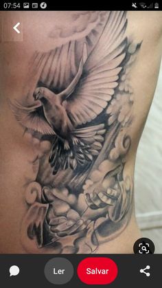 a man with a tattoo on his stomach that has a bird flying over the top