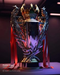 the trophy is on display in front of a dark background with red ribbon around it