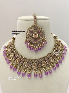 Antique Polki Necklace Set comes with earrings and tikka / Indian Jewelry/ High Quality Kundan and Polki Jewelry/ Bollywood Jewelry/Wedding Jewelry/dull  gold/Lavender/Light purple    All items are shipped from Brampton, Ontario, Canada. If you need your item by a certain day, please reach out to us for express delivery option before placing the order so that we can update the shipping for you. Standard shipping/delivery timeline Below are the estimated delivery times after the order is shipped/dispatched.  ---> USA delivery timeline * 3-5  business days to major urban centers in USA. It may take 2-3 days extra to remote locations ---> Canada delivery timeline  * 2-3 business days - GTA  & Montreal  * 2-4  business days - Rest of Ontario/Quebec * 4-6 business days-  Rest of Canada (Please Purple Necklaces With Intricate Design For Wedding, Elegant Purple Jewelry For Diwali, Purple Wedding Necklaces With Intricate Design, Purple Wedding Necklace With Intricate Design, Elegant Purple Kundan Necklace For Festive Occasions, Elegant Purple Kundan Necklace For Wedding, Purple Kundan Bollywood Jewelry, Purple Kundan Jewelry For Diwali, Purple Stone Work Jewelry For Wedding