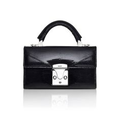 A mini reiteration of STALVEY's signature top handle, the Top Handle 2.0 is a 20cm top handle satchel with architectural envelope front. Tone-on-tone stitching positioned against stark black edge painting creates a more modern take on a classic silhouette. Custom locking closure and prominent top handle accessory. Black Lizard, Leyte, Top Handle Handbags, Trending Handbag, Bag Trends, Mini Handbags, Painting Edges, Mode Inspiration, Black Handbags