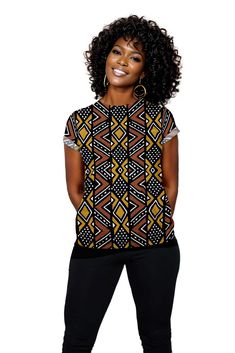 This African Mudcloth Print Women T-shirt showcases a unique and culturally-inspired design. Made from high-quality materials, this t-shirt offers a comfortable fit perfect for everyday wear. Embrace the bold and vibrant style of African prints with this one-of-a-kind piece. Product Features Please Compare your Measurements To our Size Chart This T-shirt is Designed for fashionable women. Made from 5.47 Oz. 100% polyester. Double-needle hemmed sleeves and bottom. Vivid print that will never fade Indoor Outdoor Bathroom, African Mud Cloth, Mud Cloth, Skirt Leggings, African Print, One Piece Swimsuit, African Fashion, Shirt Blouses, Everyday Wear