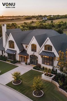 A charming countryside estate with classic architecture, expansive windows, and lush greenery, captured at sunset. House Inspiration Farmhouse, Luxury Home Exterior Design, House Claims For Dr, Rich Houses, Big White House, Bloxburg Exterior, Legend Homes, House White