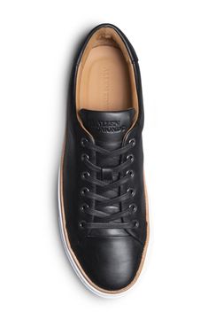 Minimal styling gives work-to-weekend versatility to this elevated sneaker designed for all-day comfort and great durability. Round toe Lace-up style Leather upper, rubber sole Imported Low-top Work Sneakers With Rubber Sole, Casual Round Toe Sneakers For Work, Casual Low-top Workwear Sneakers, Casual Low-top Sneakers For Work, Slip-on Work Sneakers With Rubber Sole, Modern Work Sneakers With Plain Toe, Modern Workwear Sneakers With Plain Toe, Low-top Sneakers With Rubber Sole For Work, Low-top Sneakers With Textured Sole For Work