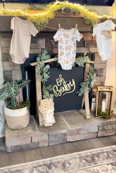 Nature inspired baby shower fireplace decor Baby Shower Fireplace Decor, Shower Fireplace, Kate Baby, Monkey Baby Shower, Nature Baby Shower, Baby Shower Decor, Kitchen Furniture Design