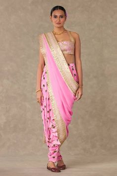 Pink pre-stitched dhoti pant saree with candy swirl, wallflower print and sheer palla embellished and embroidered border. Paired with aari embroidered bustier. - Aza Fashions Criss Cross Blouse, Pant Saree, Embroidered Bustier, Dhoti Saree, Dhoti Pants, Drape Saree, Embroidered Border, Pink Cotton Candy, Pink Saree