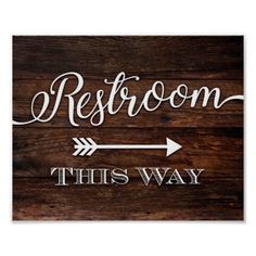 a wooden sign that says ceremony, this way and an arrow with the word on it