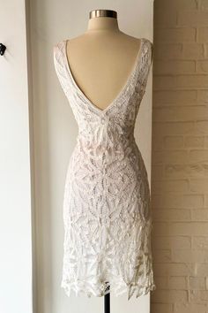 Vintage Deadstock 90s White Beaded Lace Slip Dress – Aquelarre Shop Fitted Backless Slip Dress With Lace Trim, Fitted Lace Trim Backless Slip Dress, Backless Lace Slip Dress For Wedding, Elegant Backless Dress With Delicate Lace, Fitted Slip Dress With Lace-up Back For Wedding, Fitted Lace-up Back Slip Dress For Wedding, Fitted V-neck Slip Dress With Lace Back, Sleeveless Lace Slip Dress With Lace Back, Fitted Lace Slip Dress With Lace Back