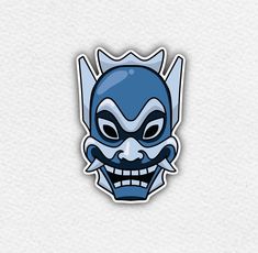 the blue demon sticker is shown on a white background, it has an evil face and