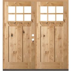 two wooden doors with windows on each side