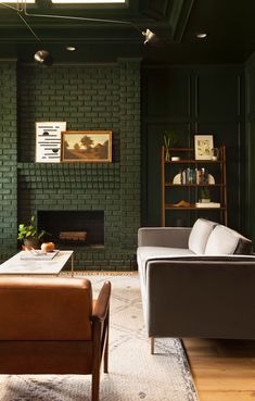 a living room filled with furniture and a fire place