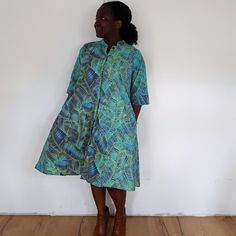 You will love our euphoria dress <3 Our loose fit colourful dresses made out of non-stretchy African print are perfect for you in case you are looking for a style idea that is versatile, comfortable, and looks fabulous year-round. All materials used to design the dresses are sourced in Kenya.  MEASUREMENT GUIDE:  We recommend asking questions about sizes or you can take your own measurements (at the bust) if unsafe. Since its an A- Line, you only need to ensure that you have the right fit for th Euphoria Dress, Dress Shirt Dress, Green Shirt Dress, Africa Dress, Asking Questions, Dress For Woman, Kitenge, Women Formals, African Dresses For Women