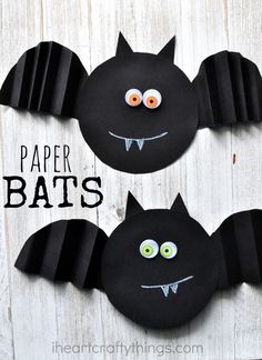 paper plate bats with eyes and fangs on them