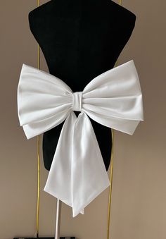 Friends, welcome to my store.        https://www.etsy.com/uk/listing/1601619992/additional-fees If you are unsure of the colour, please purchase a colour sample to match.        Our wedding bows can be customized according to your needs, you can provide the size and different color fabrics, we will make your favorite wedding bow according to the colors you provide.            Removable wedding bow made of high-grade soft satin.            The butterflies have custom pins so they can be easily pi Satin Sashes With Satin Bow For Evening, Elegant Evening Sash With Satin Bow, Evening Sash With Satin Bow, Elegant Evening Sashes With Satin Bow, Evening Sashes With Satin Bow, Evening Satin Sashes With Bow, Satin Bow With Bow Tie Back For Party, Satin Bow Tie With Ribbon For Party, Satin Ribbon Bow Tie For Evening