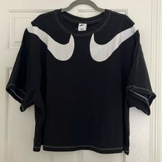 Material Details In Pic. Plus Size 2x. Fits A Regular Xl Just Fine, Oversized. Nike Cotton Oversized Tops, Oversized Nike Cotton Top, Oversized Cotton Nike Tops, Oversized Black Sporty Tops, Nike Black T-shirt For Spring, Nike Oversized Short Sleeve Tops, Nike Oversized Crew Neck T-shirt, Nike Oversized Sporty T-shirt, Trendy Nike Top With Graphic Print