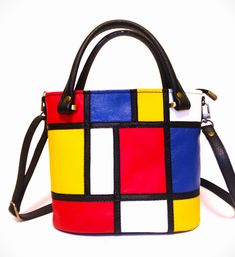 The  unique  handmade bag made of GENUINE ITALIAN LEATHER - Mondrian, in mosaic technique. - The bag is made of high quality Italian leather, soft and pleasant to the touch, it keeps its shape well. - Made in Italy. Impeccable craftsmanship and exquisite design. - The image on the bag is not a painting. The image is assembled from individual elements (colorful pieces of leather) in mosaic technique, which gives the bag a more expressive three-dimensional tangible design. The  bag with geometric Modern Multicolor Top Handle Box Bag, Multicolor Rectangular Leather Box Bag, Multicolor Leather Satchel Box Bag, Multicolor Satchel Box Bag With Adjustable Strap, Modern Multicolor Shoulder Bag For Daily Use, Modern Red Tote Box Bag, Blue Square Satchel As Gift, Blue Square Satchel For Gift, Multicolor Top Handle Box Bag With Adjustable Strap