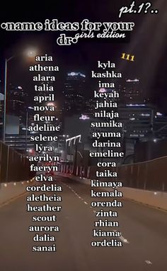 the words are written in different languages on a road at night with city lights behind them