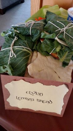 there is a pile of leafy vegetables on the table