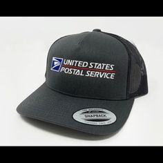 the united states postal service trucker hat is shown in black and grey with white lettering