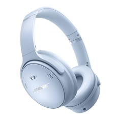 the white headphones are on display against a white background