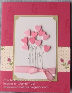 a card with pink hearts on it