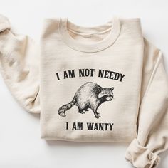 I Am Not Needy I Am Wanty Sweatshirt, Funny Raccoon Sweatshirt, Vintage Sweatshirt, Meme Sweatshirt, Sarcastic Shirt, Retro Sweatshirt 🧵 HOW TO ORDER   - Pick your size and color from the drop down menus  - Review the sizing and color options in the listing photos  - Add the item to your cart and complete the checkout process  - We'll start working on your order right away! 🧵SIZING  - Please review the listing photos to see the size charts  - These photos will also show you how to order a regu Woman Meme, Raccoon Shirt, Older Sister, Older Brother, Easily Distracted, Sweatshirt Outfit, Grandma Gift, Sweatshirt Vintage, Funny Sweatshirts