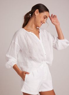 Coming Soon! To be notified of availability sign up for the waitlist. Elevate your wardrobe with our Shirred Neck Blouse , designed for a flowy fit that is both breezy and comfortable. This fun and versatile top is perfect for any occasion, whether you're dressing up for a night out or keeping it casual for a day at the beach. Made from soft tissue linen. 100% Linen Blouse Designed, Comfortable Blouses, Bella Dahl, Leather Outerwear, Cardigan Sweater Dress, Dress The Population, Linen Blouse, Leather Blazer, Romper With Skirt