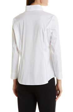 This picture-of-polish shirt is crafted from crisp poplin with a split neckline. Split neck Stand collar Long sleeves 71% cotton, 31% nylon, 4% spandex Hand wash, line dry Imported Formal Poplin Blouse For Spring, Elegant Poplin Tops For Office, Elegant Poplin Tops For The Office, Elegant Poplin Blouse For Workwear, Elegant Poplin Tops, Elegant Collared Poplin Top, Elegant Poplin Shirt For Office, Classic Poplin Blouse For Workwear, Fitted Poplin Office Top