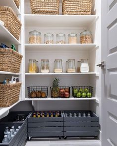 an organized pantry with baskets and food items