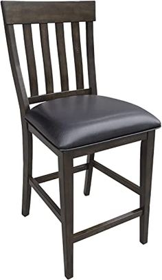 a wooden chair with black leather upholstered seat