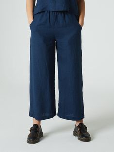 "DESCRIPTION Creating different casual outfits will be easy with this minimal and versatile pair of pants called Ocean. Be it a walk with a friend or a semi-formal meeting, the high-waisted Ocean pants will not let you down when paired with any kind of blouse or shirt. The topstitched elastic waistband, deep front pockets, and wide legs are the minimal details that can help you get the maximum. SIZING AND FIT This garment is true to size, and we recommend choosing the size you usually wear. If y Blue Wide Leg Linen Pants, Blue Linen Wide-leg Pants, Blue Linen Wide Leg Pants, Blue Linen Ankle-length Wide Leg Pants, Casual Wide-leg Linen Capris, Blue Linen Wide-leg Bottoms, Blue Linen Wide Leg Bottoms, Straight Linen Culottes With Pockets, Linen Straight Capris With Elastic Waistband