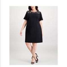 Embroidery Detailed Black Dress Spring Embellished Black Midi Dress, Spring Black Embellished Midi Dress, Embellished Black Midi Dress For Spring, Black Embellished Midi Dress For Spring, Formal Black Dress With Floral Embroidery, Elegant Black Calvin Klein Dress, Elegant Black Embroidered Midi Dress, Formal Black Embroidered Dress, Elegant Black Embellished Embroidered Dress