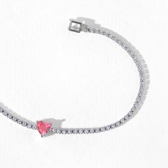 A modern twist on a timeless piece, this classic tennis bracelet features a gorgeous gradient of heart-shaped studs at its center. Trust us when we say that you'll be reaching for this one over and over. Elegant Heart-shaped Tennis Bracelet With Diamond Accents, Fine Jewelry Heart Cut Bracelet For Valentine's Day, Trendy Silver Cubic Zirconia Tennis Bracelet, Heart-shaped Cubic Zirconia Tennis Bracelet With Diamond Accents, Cubic Zirconia Heart Cut Tennis Bracelet, Valentine's Day Heart Cut Fine Jewelry Bracelets, Valentine's Day Fine Jewelry Heart Bracelet, Heart-shaped Diamond Accent Tennis Bracelet For Anniversary, Heart-shaped Diamond Tennis Bracelet With Accents