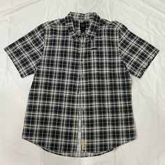 Brand: Harley Davidson Style: Short Sleeve Button Down With Pocket Color: Plaid / Check Print Condition: Brand New, Excellent, Never Worn Flaws: None Size: X-Large * Smoke-Free Home * Pet Friendly * Same Day Or Next Day Shipping (Post Office Is Closed On Weekends) Casual Black Shirt With Placket, Casual Plaid Shirt With Snap Buttons, Black Cotton Button-up Short Sleeve Shirt, Casual Black Button-up Short Sleeve Shirt, Casual Black Shirt With Snap Buttons, Casual Black Short Sleeve Shirt With Button Closure, Casual Plaid Tops With Placket, Casual Cotton Short Sleeve Shirt With Snap Buttons, Black Cotton Shirt With Button Closure