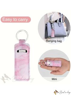 a pink case with a keychain attached to it and the words easy to carry hanging bag