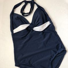 One Piece Swimsuit Size M/M Never Worn.New Without Tags Navy Beachwear Bodysuit For Pool, Navy Stretch Bodysuit For Beach, Navy Stretch Bodysuit For The Beach, Navy One-piece Beachwear Bodysuit, Navy One-piece Bodysuit For Beachwear, Navy Fitted Bodysuit For Summer, Chic Navy Swimwear For Vacation, Navy Beachwear Bodysuit For Summer, Navy Summer Beach Bodysuit