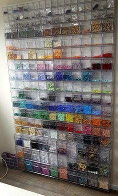 a wall filled with lots of different types of beads