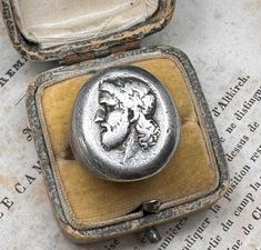 Lovely and rare dandy silver signet ring from the beginning of 1900, antique French hallmarks (Wild Boar punch), massive handmade antique signet ring, face measures 19 x 22 mm. Zeus Ring, Greek mythology ring, unisex size, pinky ring, in good antique condition, would make a nice gift for someone special!  Box on the photos not included! Material: solid silver (French hallmarks) Weight: approx. 20.9 g US Size 8 (EU 57) Antique Silver Engraved Ring, Antique Engraved Silver Ring, Antique Sterling Silver Engraved Ring, Antique Sterling Silver Signet Ring, Vintage Silver Ring With Antique Finish, Vintage Antique Silver Signet Ring For Anniversary, Antique Round Signet Ring, Antique White Gold Signet Ring Collectible, Vintage Silver Signet Ring With Antique Finish