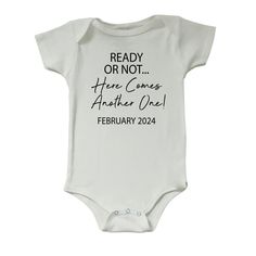 Get ready to share your excitement in style with our "Ready or Not, Here Comes Another One" Baby Announcement Onesie, personalized with your special date! 👶👣 🌟 This adorable onesie is a playful and charming way to let the world know that your family is growing. Featuring the fun message "Ready or Not, Here Comes Another One" alongside a custom date of your choice, it's the perfect way to announce your expanding family with a touch of humor and love. Fabric Organic ring-spun, combed cotton Thr Hello Im New Here Onesie, Onsie Pregnant Announcement, Hi I’m New Here Onesie, Cheap Summer Onesie For Pregnancy Announcement, First Baby Announcements, Funny Customizable Cotton Onesie, Baby Announcement Onesie, Here Comes, Another One