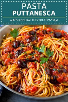 pasta with tomato sauce and olives in a pan