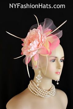 Women’s Pink Sinamay Straw Large Flower Feather Bow Fashion Designer Haute Couture Hat Headpiece Wedding Fascinator Hair Accessory. A Large Pastel Pink Horsehair Crinoline Bow Is Placed On A Simulated Pink Sinamay Straw Round Base, Accented With A Large Vintage Ivory Yellow And Pink Handmade Silk Flower, Embellished With White Goose Biot Feathers. This Formal Art Deco Styled 1920’s Style Flapper Hat Wedding Headpiece Can Be Worn In Different Positions. This ladies bespoke couture formal designer wedding fascinator hat is appropriate to wear for horse races, The Kentucky Derby, The Dubai World Cup, The Royal Ascot, The Melbourne Cup, Belmont Stakes, The Preakness Stakes horse racing, Church, weddings, and special occasion. This lovely Spring and Summer fascinator is also suited for mother o Kentucky Derby Wedding, Special Occasion Hats, Mother Of The Bride Hats, Derby Wedding, Derby Ideas, Preakness Stakes, Custom Made Hats, Bow Fashion, Bridal Fascinator