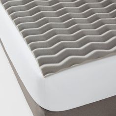 the mattress is made up and ready for someone to use it in their home or office