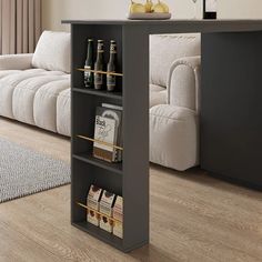 a living room with a couch, coffee table and bookshelf on the floor