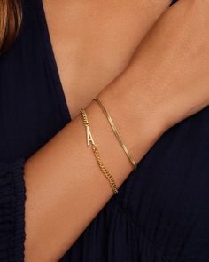 Achieve a timeless look with the Venice Mini Bracelet. This gorgeous gold-plated bracelet features a classic herringbone chain design that is perfect for any occasion. To wear, stack alongside other gold or beaded bracelets. More is more! Venice Mini Bracelet in Gold, Women's by gorjana Classic Snake Chain Bracelet, Perfect As A Gift, Classic Snake Chain Bracelet For Gift, Classic Snake Chain Bracelet Gift, Classic Adjustable Snake Chain Bracelets, Classic Snake Chain Bracelet, Classic Gold Jubilee Bracelet With Snake Chain, Classic Gold Name Bracelet Hypoallergenic, Classic Gold Hypoallergenic Name Bracelet, Classic Snake Chain Bracelets For Gift