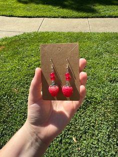 Imagine you're sitting next by the pool soaking up the sun, drinking a strawberry lemonade wearing these cute strawberry earrings, what an amazing way to spend the summer right?  These super cute earrings are light in weight and are accessorized with red beads to help bring out more color! Summer Casual Jewelry With Fruit Design, Casual Summer Jewelry With Fruit Design, Sweet Handmade Summer Jewelry, Handmade Sweet Summer Jewelry, Casual Everyday Earrings For Summer, Summer Fruit Design Drop Earrings, Summer Dangle Earrings As A Gift, Summer Pink Earrings With Fruit Design, Summer Pink Fruit Design Earrings