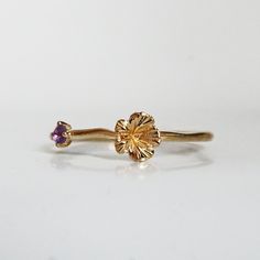 Our special collection of birth flower rings are inspired by the love of wearing something meaningful. Each birth flower is adorned with that month's birthstone. February's birth flower is Violet and the birthstone is amethyst. Materials: - 14K solid gold - 2mm natural amethyst - 1.1mm band thickness ** This item is specially made for you. Please allow 1-2 week lead time.  Shipping: Domestic: Free standard shipping via USPS  International: $17 for international standard shipping. $10 to Canada O Flower Shaped Promise Ring With Birthstone, Yellow Gold Birthstone Flower Ring, Flower Birthstone Ring, Flower Shaped Amethyst Jewelry For Anniversary, Purple Flower Ring For Anniversary, Violet Birth Flower, February Violet, February Birth Flower, February Birth Flowers